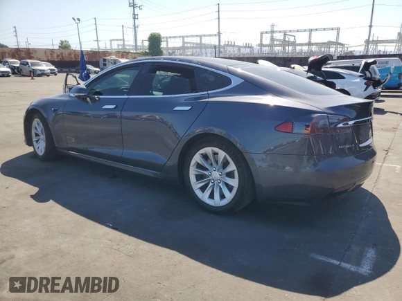 2019 Tesla Model S 75D with VIN 5YJSA1E2XKF305595, listed as a Copart auction lot 51838965 with Not provided miles and Salvage title. Bid and sale history available at DreamBid. Image 2.