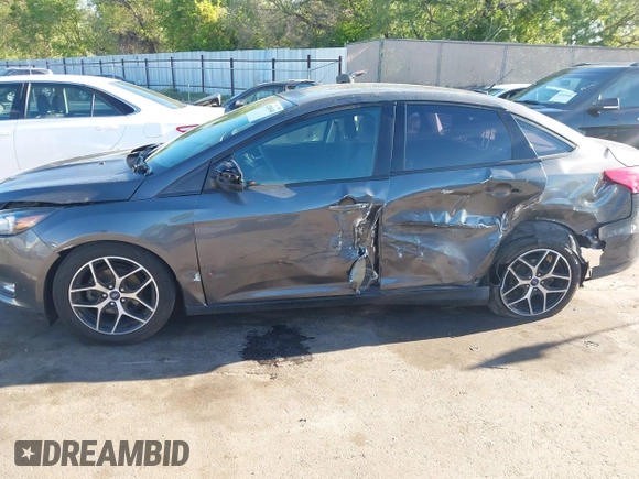 2018 Ford Focus SE with VIN 1FADP3FE0JL270966, listed as a IAAI auction lot 42206548 with 89,067 mi miles and . Bid and sale history available at DreamBid. Image 14.