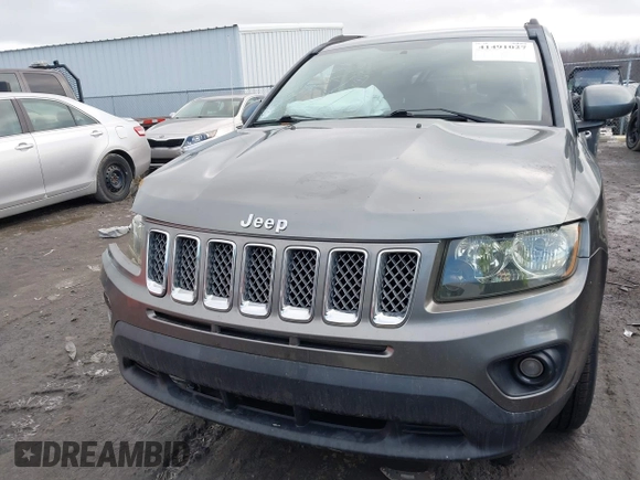 2014 Jeep Compass High Altitude with VIN 1C4NJCEA4ED620730, listed as a IAAI auction lot 41491027 with 73,784 mi miles. Bid and sale history available at carsss.com. Image 13.