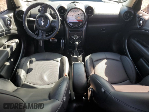 2014 MINI Countryman S with VIN WMWZC3C5XEWP25792, listed as a Copart auction lot 58583455 with 83,831 mi miles and Salvage title. Bid and sale history available at DreamBid. Image 8.