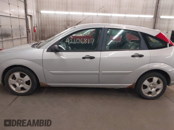 2005 Ford Focus S with VIN 3FAFP37N15R138393, listed as a IAAI auction lot 42106817 with 144,047 mi miles and . Bid and sale history available at carsss.com. Image 15.