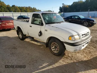 2001 Mazda B-Series 2WD Truck DS with VIN 4F4YR12U41TM25842, listed as a Copart auction lot 76827864 with 252,323 mi miles and Salvage Title. Bid and sale history available at carsss.com. Image 4.