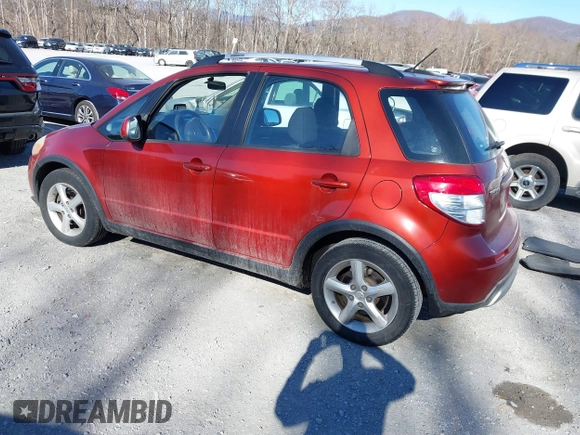 2009 Suzuki SX4 Touring AWD z VIN JS2YB417595100925, wystawiony jako IAAI lot #41693882 z przebiegiem 76 972 mil mil oraz . Historia ofert i sprzedaży dostępna na DreamBid. Obrazek 3.