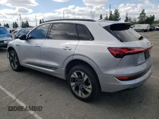 2021 Audi e-tron Premium with VIN WA1AAAGE7MB006939, listed as a Copart auction lot 45187924 with 49,600 mi miles and . Bid and sale history available at DreamBid. Image 2.