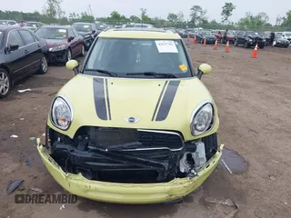 2012 MINI Countryman S z VIN WMWZC3C59CWL82955, wystawiony jako IAAI lot #42237702 z przebiegiem 61 903 mil mil oraz . Historia ofert i sprzedaży dostępna na DreamBid. Obrazek 13.