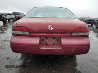 1996 Nissan Altima XE z VIN 1N4BU31D1TC118891, wystawiony jako Copart lot #73860614 z przebiegiem 158 039 mil mil oraz Szkoda całkowita • Salvage title. Historia ofert i sprzedaży dostępna na DreamBid. Obrazek 6.