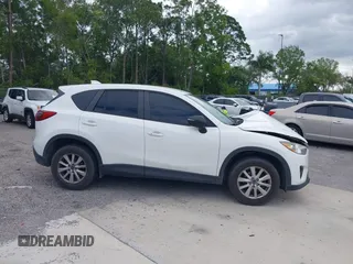 2015 Mazda CX-5 Touring with VIN JM3KE2CY8F0545967, listed as a IAAI auction lot 41909920 with 101,781 mi miles. Bid and sale history available at carsss.com. Image 13.