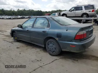 1996 Honda Accord DX with VIN 1HGCD5623TA023666, listed as a Copart auction lot 65288494 with 215,050 mi miles and Clean Title. Bid and sale history available at carsss.com. Image 2.