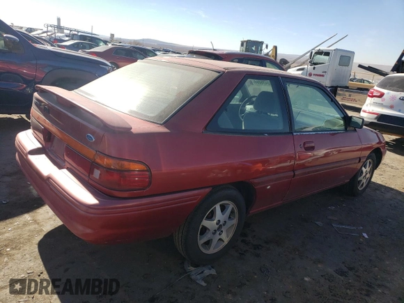 1996 Ford Escort z VIN 1FASP11J0TW138176, wystawiony jako Copart lot #82435494 z przebiegiem 62 107 mil mil oraz Czysty tytuł • Clean title. Historia ofert i sprzedaży dostępna na DreamBid. Obrazek 3.