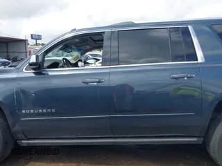 2019 Chevrolet Suburban Premier z VIN 1GNSCJKC0KR139323, wystawiony jako IAAI lot #42100758 z przebiegiem Nie podano mil oraz . Historia ofert i sprzedaży dostępna na DreamBid. Obrazek 14.
