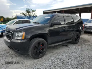 2010 Chevrolet Tahoe LTZ with VIN 1GNUKCE01AR127365, listed as a Copart auction lot 60711715 with 151,962 mi miles and Salvage title. Bid and sale history available at DreamBid. Image 1.