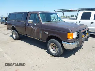 1988 Ford F-150 с VIN 1FTEF14Y1JPA75504, выставлен на аукционе IAAI как лот 42473753 с пробегом 12 730 миль миль и . История ставок и продаж доступна на DreamBid. Изображение 1.