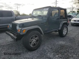 2002 Jeep Wrangler Sport with VIN 1J4FA49SX2P726553, listed as a Copart auction lot 42559245 with 198,584 mi miles and Clean Title. Bid and sale history available at carsss.com. Image 1.