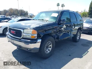 2002 GMC Yukon SLT with VIN 1GKEC13T92R162978, listed as a IAAI auction lot 41851599 with 213,789 mi miles. Bid and sale history available at carsss.com. Image 17.