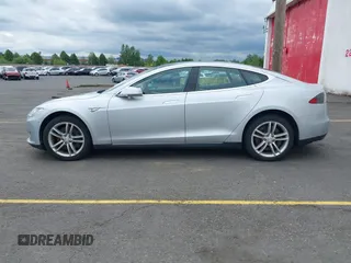2014 Tesla Model S 60 with VIN 5YJSA1S13EFP53662, listed as a IAAI auction lot 42249930 with Not provided miles and . Bid and sale history available at DreamBid. Image 13.