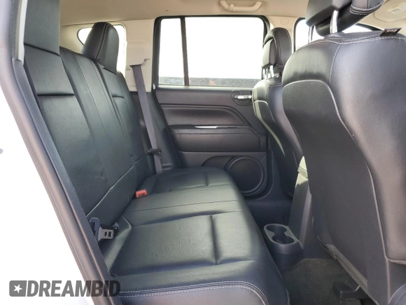 2016 Jeep Compass High Altitude with VIN 1C4NJDEB3GD797691, listed as a Copart auction lot 80340604 with 95,404 mi miles and Salvage title. Bid and sale history available at DreamBid. Image 11.
