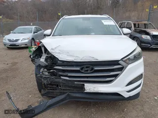 2016 Hyundai Tucson SE with VIN KM8J3CA46GU105087, listed as a IAAI auction lot 40978420 with 103,527 mi miles. Bid and sale history available at carsss.com. Image 12.