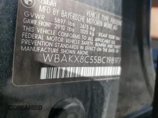 2011 BMW 7 Series with VIN WBAKX8C55BC198177, listed as a Copart auction lot 77016924 with 99,275 mi miles and Salvage title. Bid and sale history available at DreamBid. Image 12.