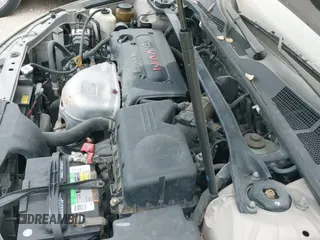 2002 Toyota Camry LE z VIN 4T1BE32K52U614799, wystawiony jako IAAI lot #42422888 z przebiegiem 192 893 mil mil oraz . Historia ofert i sprzedaży dostępna na DreamBid. Obrazek 12.