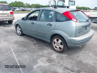 2004 Ford Focus with VIN 3FAFP37Z74R103228, listed as a IAAI auction lot 42658143 with 90,519 mi miles and . Bid and sale history available at DreamBid. Image 3.