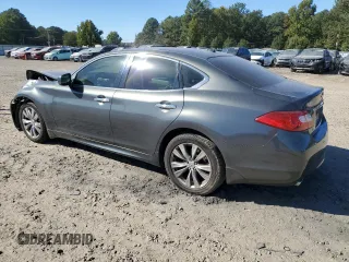 2013 Infiniti M37 with VIN JN1BY1AP2DM510404, listed as a Copart auction lot 76295144 with 134,586 mi miles and Salvage Title. Bid and sale history available at carsss.com. Image 2.