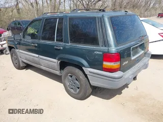 1994 Jeep Grand Cherokee Laredo with VIN 1J4GZ58S0RC266616, listed as a IAAI auction lot 41890812 with 190,000 mi miles. Bid and sale history available at carsss.com. Image 3.