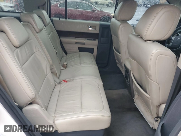 2009 Ford Flex SEL z VIN 2FMDK52CX9BA09974, wystawiony jako Copart lot #57184765 z przebiegiem 184 769 mil mil oraz Szkoda całkowita • Salvage title. Historia ofert i sprzedaży dostępna na DreamBid. Obrazek 11.