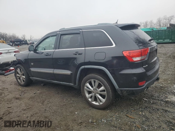 2011 Jeep Grand Cherokee 70th Anniversary with VIN 1J4RR4GT3BC675003, listed as a Copart auction lot 85105224 with 184,430 mi miles and Salvage Title. Bid and sale history available at carsss.com. Image 2.