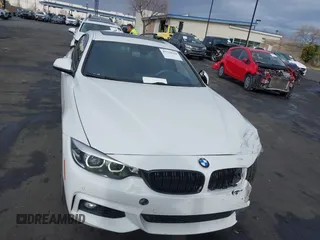 2019 BMW 4 Series 440i with VIN WBA4J5C52KBM65208, listed as a IAAI auction lot 41734154 with 52,477 mi miles and . Bid and sale history available at DreamBid. Image 13.