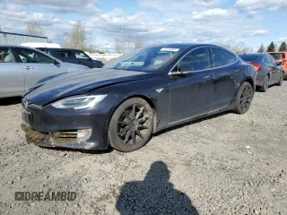 2016 Tesla Model S 90D with VIN 5YJSA1E2XGF150490, listed as a Copart auction lot 51070365 with 144,457 mi miles and Salvage Title. Bid and sale history available at DreamBid. Image 1.