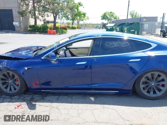 2017 Tesla Model S 100D with VIN 5YJSA1E44HF220391, listed as a IAAI auction lot 37381201 with Not Provided miles and . Bid and sale history available at DreamBid. Image 14.