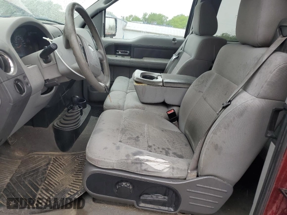 2004 Ford F-150 STX with VIN 1FTRX14W94NA19839, listed as a Copart auction lot 57643955 with 264,962 mi miles and Salvage title. Bid and sale history available at DreamBid. Image 7.