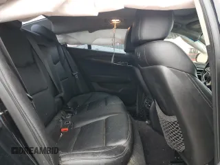 2018 Cadillac ATS RWD z VIN 1G6AA5RX4J0184510, wystawiony jako Copart lot #42934545 z przebiegiem 104 677 mil mil oraz Szkoda całkowita • Salvage title. Historia ofert i sprzedaży dostępna na DreamBid. Obrazek 11.