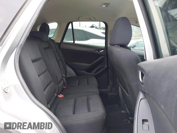 2014 Mazda CX-5 Touring with VIN JM3KE2CY3E0429025, listed as a IAAI auction lot 41680713 with 113,065 mi miles. Bid and sale history available at carsss.com. Image 8.