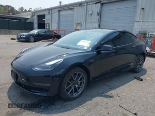 2023 Tesla Model 3 z VIN 5YJ3E1EA4PF565899, wystawiony jako IAAI lot #42436473 z przebiegiem 30 141 mil mil oraz . Historia ofert i sprzedaży dostępna na DreamBid. Obrazek 2.