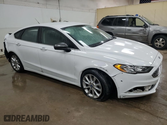 2017 Ford Fusion SE with VIN 3FA6P0H76HR396864, listed as a Copart auction lot 43810915 with 128,667 mi miles and Clean title. Bid and sale history available at DreamBid. Image 4.