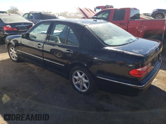 2001 Mercedes-Benz E-Class with VIN WDBJF65J01B325792, listed as a Copart auction lot 76328704 with 101,886 mi miles and Salvage Title. Bid and sale history available at carsss.com. Image 2.