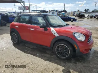 2015 MINI Countryman with VIN WMWZB3C58FWR44187, listed as a Copart auction lot 48236575 with 84,791 mi miles and Salvage Title. Bid and sale history available at DreamBid. Image 4.