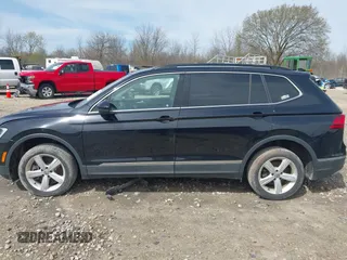 2021 Volkswagen Tiguan SE with VIN 3VV2B7AX4MM050282, listed as a IAAI auction lot 42124808 with 80,082 mi miles and . Bid and sale history available at DreamBid. Image 15.