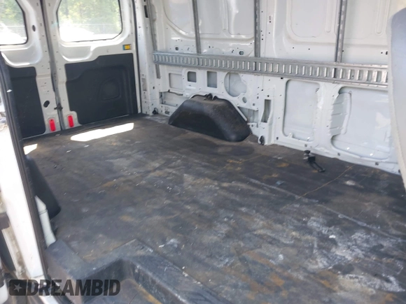 2015 Ford Transit Cargo with VIN 1FTNE1YM1FKB32377, listed as a IAAI auction lot 41976900 with 232,062 mi miles and . Bid and sale history available at DreamBid. Image 8.