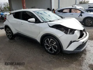 2018 Toyota C-HR XLE with VIN JTNKHMBX4J1002800, listed as a Copart auction lot 88785135 with 69,335 mi miles and Salvage Title. Bid and sale history available at carsss.com. Image 4.