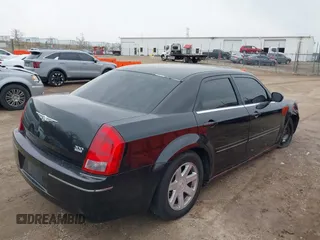 2005 Chrysler 300 Touring with VIN 2C3JA53G85H135564, listed as a IAAI auction lot 41822832 with 160,530 mi miles and . Bid and sale history available at DreamBid. Image 4.
