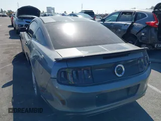 2014 Ford Mustang V6 with VIN 1ZVBP8AM9E5210284, listed as a IAAI auction lot 41957298 with 108,579 mi miles. Bid and sale history available at carsss.com. Image 3.