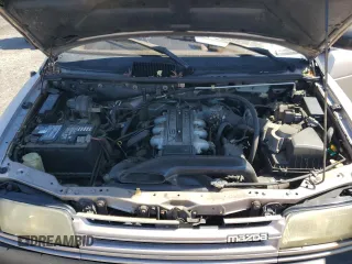 1992 Mazda MPV z VIN JM3LV5222N0453058, wystawiony jako Copart lot #72283634 z przebiegiem 174 084 mil mil oraz Szkody całkowita. Historia ofert i sprzedaży dostępna na DreamBid. Obrazek 12.