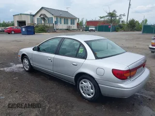 2002 Saturn SL z VIN 1G8ZK52762Z131497, wystawiony jako IAAI lot #42086108 z przebiegiem 119 273 mil mil oraz . Historia ofert i sprzedaży dostępna na DreamBid. Obrazek 3.