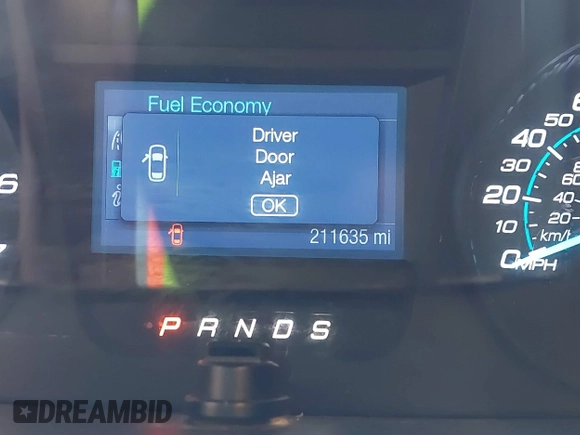 2014 Ford Taurus SE with VIN 1FAHP2D89EG136335, listed as a IAAI auction lot 41880655 with 211,635 mi miles. Bid and sale history available at carsss.com. Image 7.