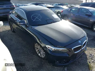 2016 BMW 2 Series 228i with VIN WBA1F9C5XGV544661, listed as a IAAI auction lot 41516695 with 84,243 mi miles. Bid and sale history available at carsss.com. Image 1.