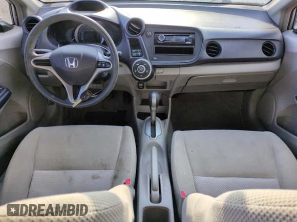 2010 Honda Insight LX with VIN JHMZE2H51AS011243, listed as a Copart auction lot 54445555 with 224,722 mi miles and Salvage Title. Bid and sale history available at DreamBid. Image 8.