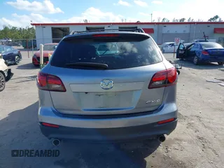 2015 Mazda CX-9 Sport with VIN JM3TB2BA1F0467162, listed as a IAAI auction lot 41565602 with 127,957 mi miles and . Bid and sale history available at carsss.com. Image 16.