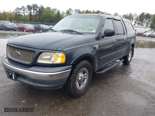 2001 Ford F-150 SuperCrew XLT with VIN 1FTRW07L41KB78053, listed as a IAAI auction lot 41965594 with 303,647 mi miles. Bid and sale history available at carsss.com. Image 2.